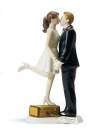 A Kiss and We're Off Wedding Topper